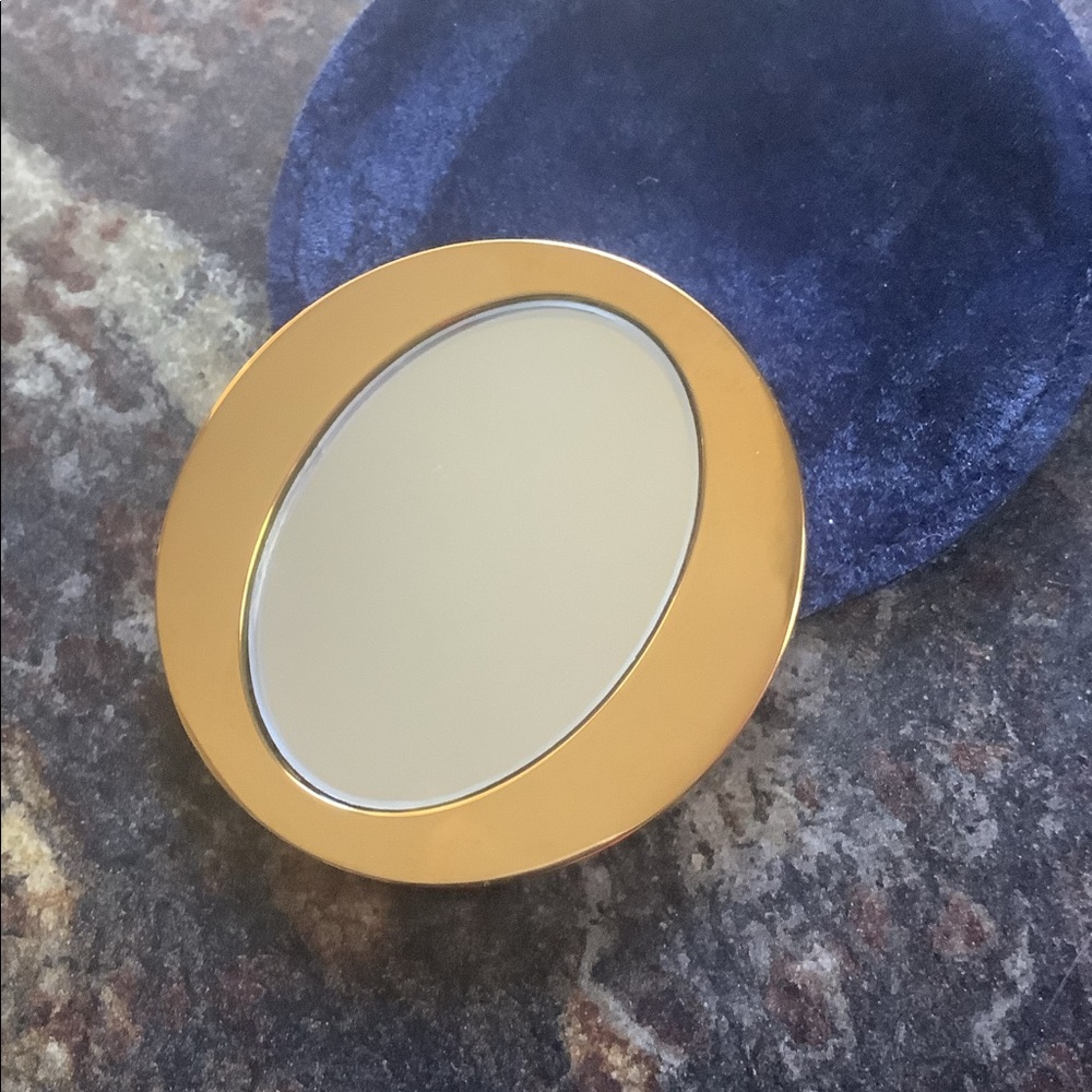 Brass DIOR purse makeup mirror.